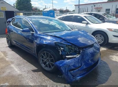 Photo TESLA model 3 long range/mid range/standard range/standard range plus.