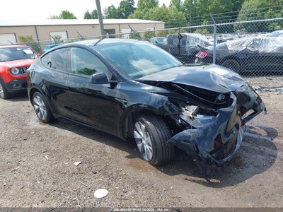 Photo TESLA model y awd/long range dual motor all-wheel drive.