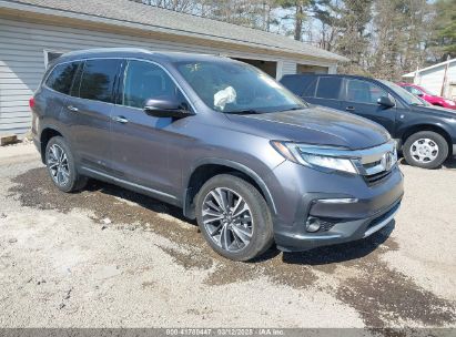 Photo HONDA pilot awd elite.