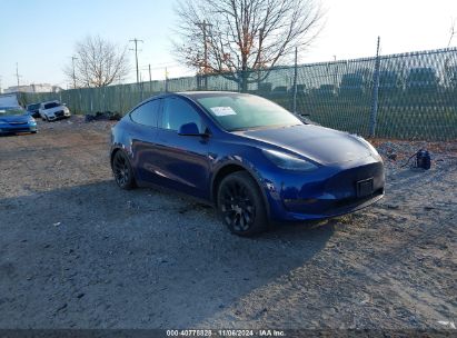 Photo TESLA model y awd/long range dual motor all-wheel drive.