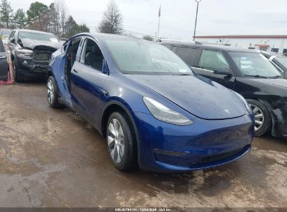 Photo TESLA model y awd/long range dual motor all-wheel drive.